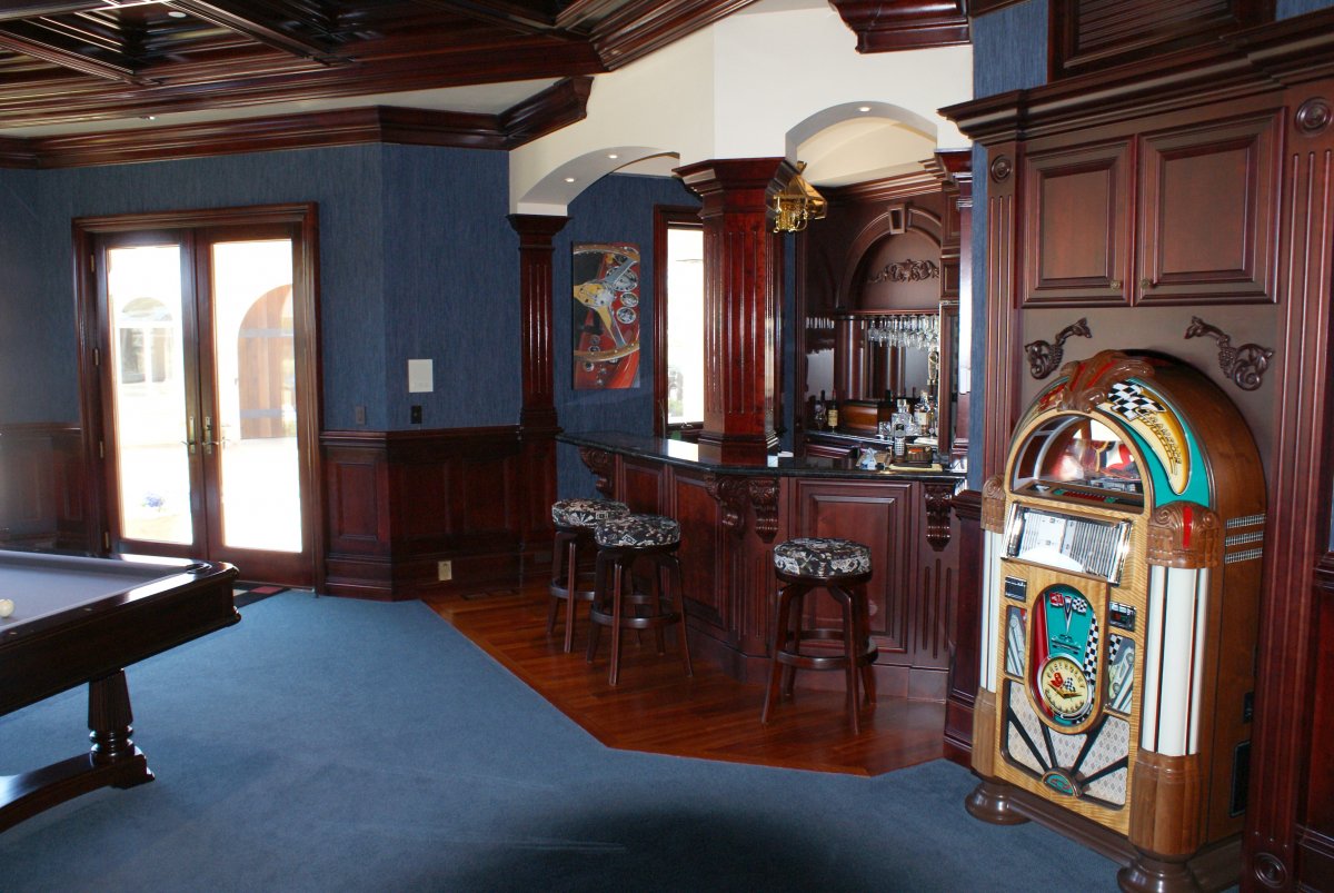 the-billiard-and-game-room-features-a-full-service-bar-and-jukebox