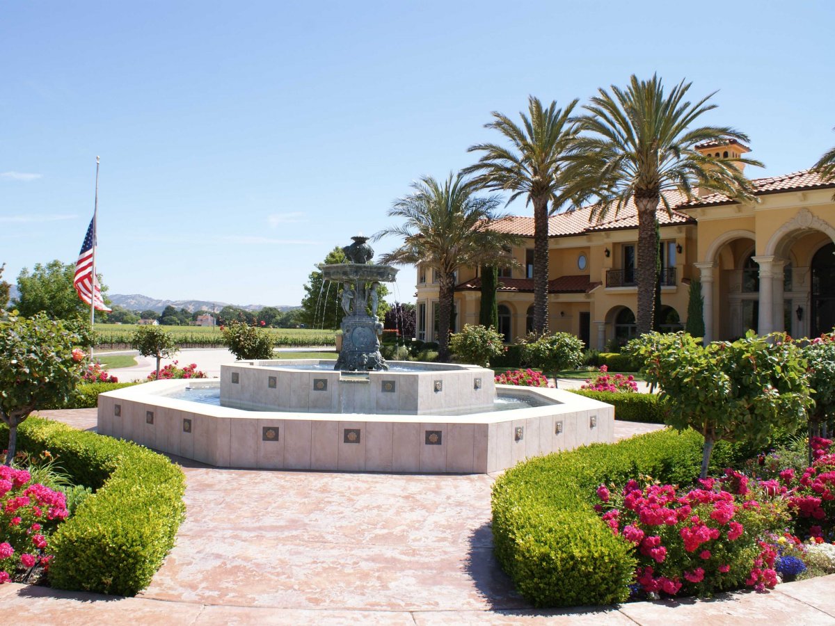the-property-is-surrounded-by-63-acres-of-cabernet-sauvignon-vines-the-front-of-the-home-is-marked-by-a-large-fountain
